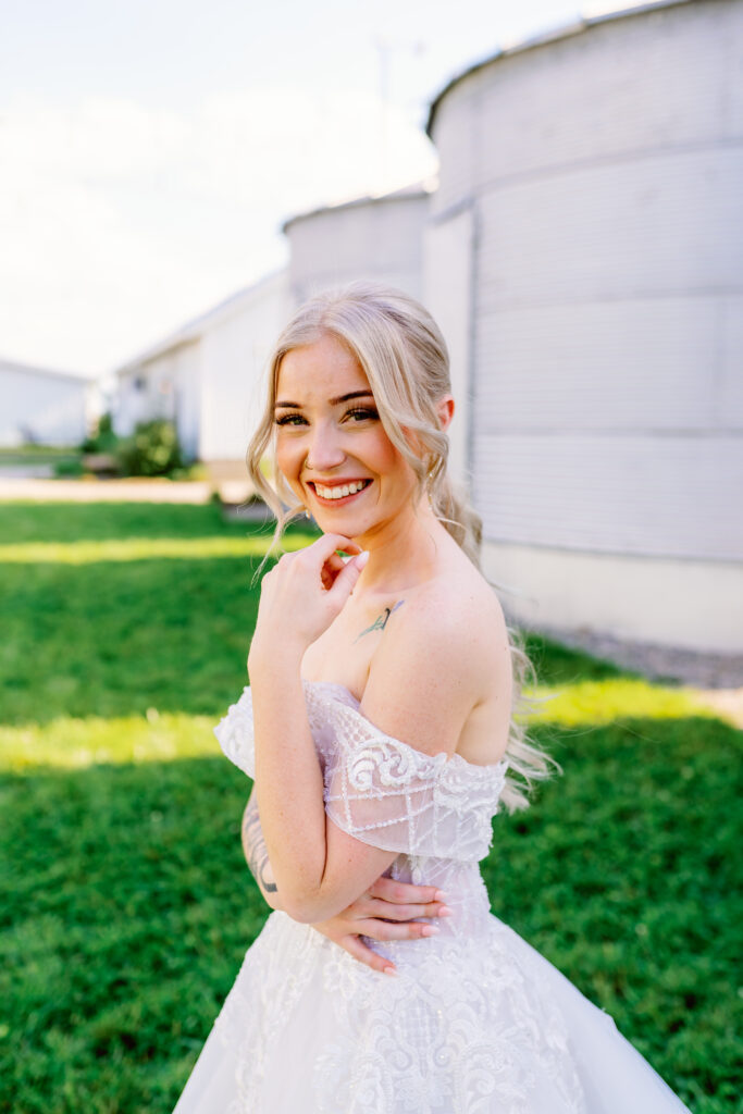 bride laughing bridal portrait at silos
