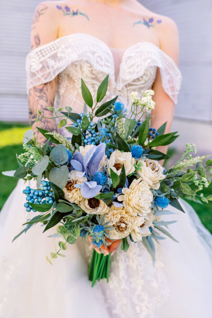 wood flowers by petals all around florist