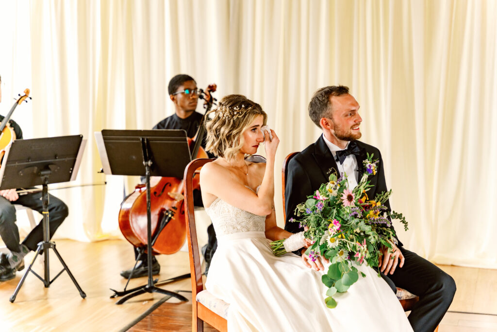 bride emotional over ceremony 
