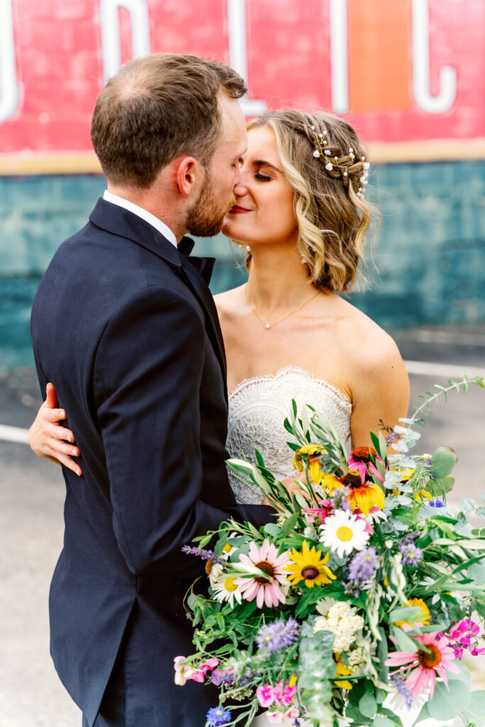 bride and groom infront of 2nd Street Market in Dayton 