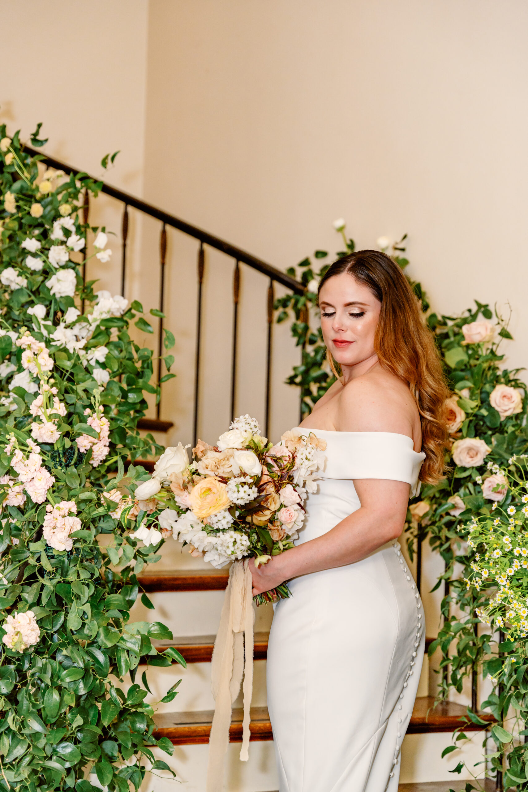 The bride ascending the staircase.