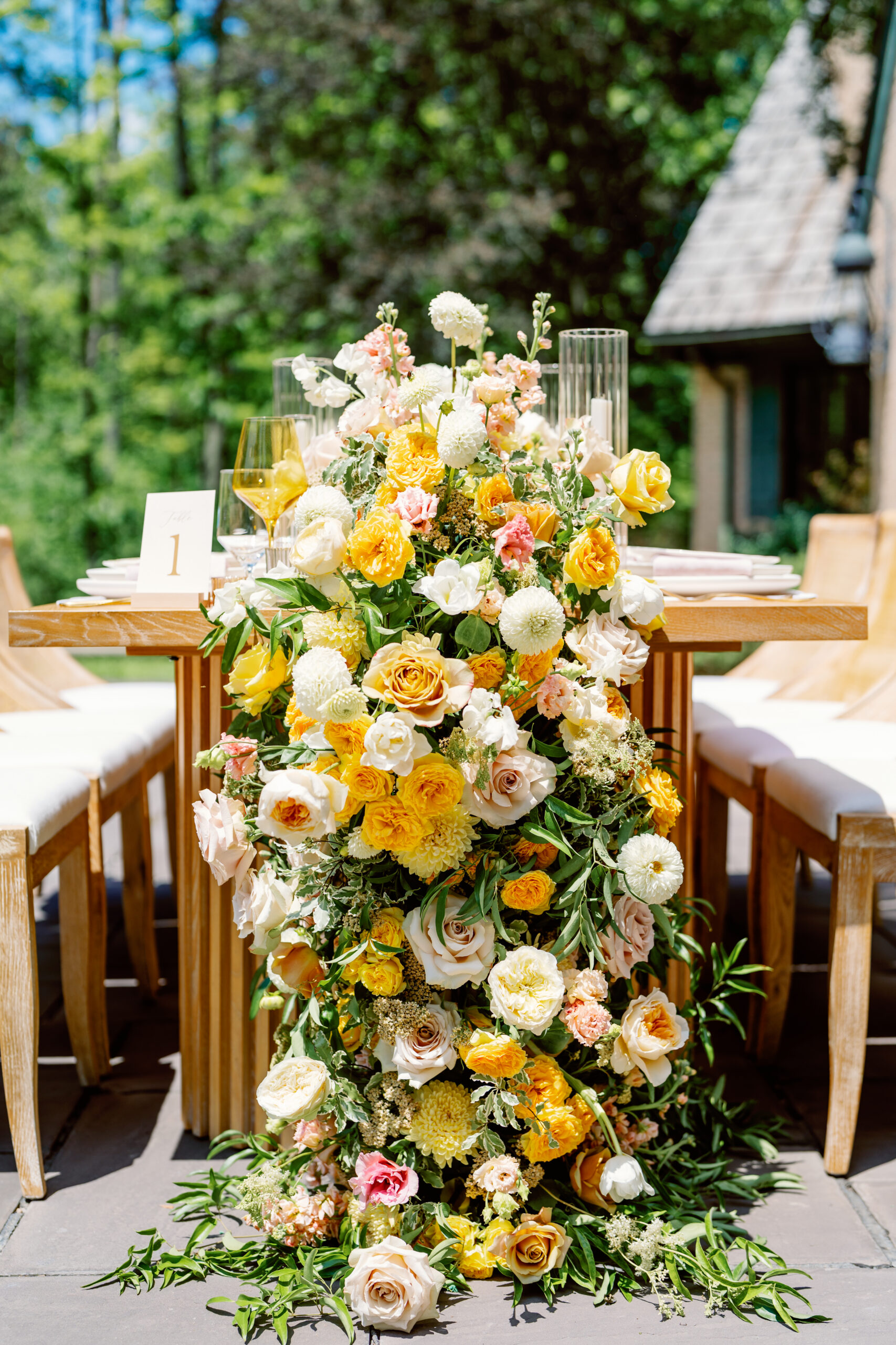 florals cascading down a table at a romantic estate venue